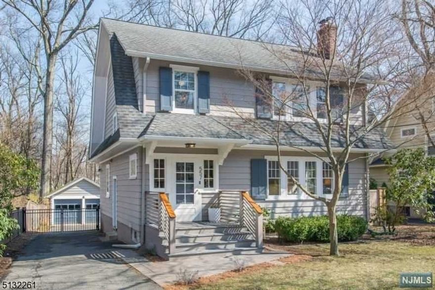 Welcome to this charming and sophisticated, light filled colonial, situated on a private, deep lot in desirable Upper Montclair. The formal foyer leads to a spacious, bright living room with a woodburning fireplace. The updated kitchen features stainless appliances and a cozy breakfast bar. Well suited for entertaining, the formal dining room has doors which open to an expansive, multi-tiered deck overlooking a well manicured, wooded property. The powder room and additional space adjoining the dining room rounds out the first floor. The second level has three bedrooms, plus a bonus room (with closet ) which could be used as an office or nursery. The primary bedroom has an oversized cedar closet. The primary bath has radiant heated floor, perfect for a cold winter day. The upper third level is walk-up attic storage. A full basement has a laundry area, designated recreation area, toilet, ample storage room and a brand new gas furnace.