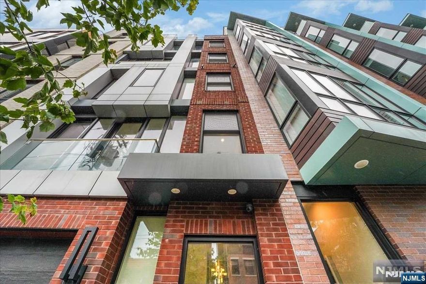Welcome home to your 3 bedroom / 2.5 bath, modern duplex in the heart of Downtown Jersey City. Built in 2016, and full of natural light from every angle, this ultra modern condo in a 2-family building comes complete with a private backyard, video intercom system, dark bamboo flooring throughout, central air, in-unit washer/dryer, huge storage space, floor to ceiling windows, motorized shades, ceiling fans, kitchen and dining room separate from the living room, half bath on the main floor, two full bathrooms on the bedroom level. Kitchen features quartz countertops, beautiful backsplash, pot filler, as well as Kitchen Aid and Bosch appliances. Baths are outfitted with Toto toilets, Porcelanosa tiles, glass shower doors, and waterfall shower heads. Primary bedroom features a walk-in closet with 2 windows! Building is energy efficient with spray foam insulation. Developed by BGT Enterprises. Steps to all the bars, shops, and restaurants that Downtown Jersey City has to offer. Short walk to Grove Street PATH. Seller is offering 1 year of paid parking around the corner.