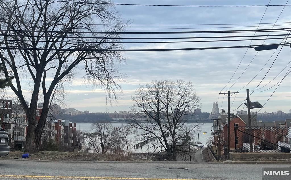 Photo of 1332 River Road, Edgewater, NJ 07020 (MLS # 26008086)