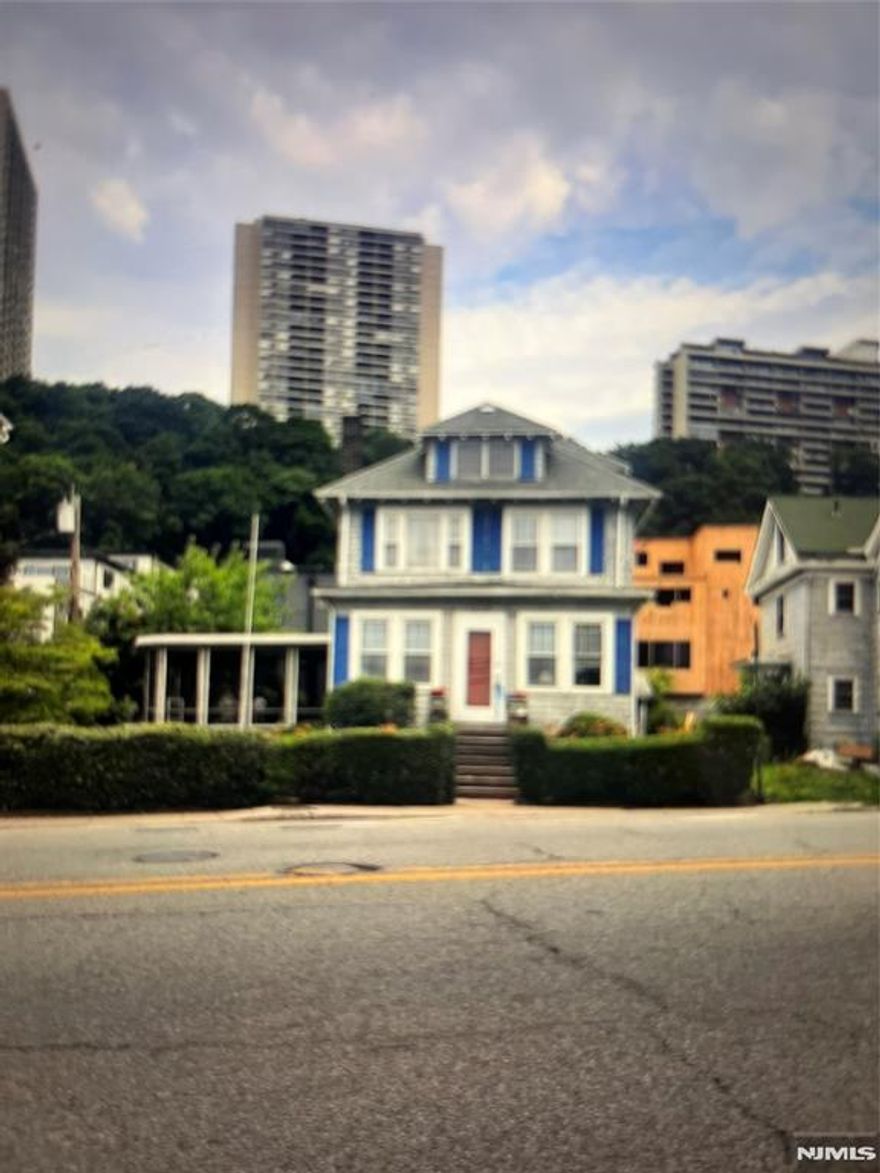 Magnificent unobstructed view of the Hudson River. short distance to: Shopping, transportation, schools, entertainment, etc. Older Colonial in need of some TLC physical attention. Enjoy, screen porch/ deck ; enjoy driveway with garage short walk to ferry to NYC Dwelling sold "as is"