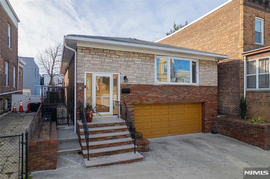 Fully updated 2-family home in a prime North Bergen location. The second-floor unit offers 2 bedrooms and 1 full bath, hardwood floors throughout, in-unit laundry, stainless steel kitchen appliances, central vacuum, and was renovated approximately 2 years ago. The first-floor unit features a studio layout with kitchen, full bathroom, and living area, with ceiling height of approximately 7.4 ftâ€”ideal for extended living or flexible use. Property includes a sprinkler system, large backyard, two-car garage, and two additional driveway parking spaces. Conveniently located near transportation, shopping, schools, and major highways. Property sold strictly as-is.