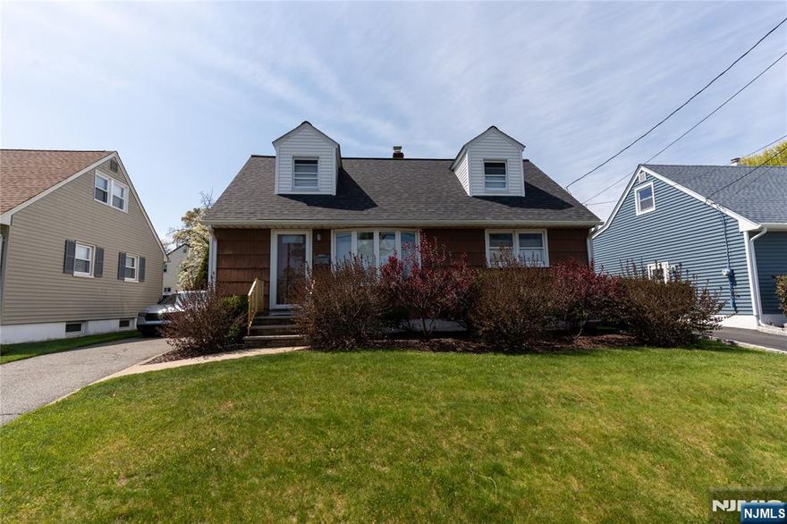 A beautifully maintained 3-bedroom, 2-full-bathroom home in Clifton's highly desirable Allwood Section. Just unpack and move right in! This inviting home features a stunning kitchen with granite countertops, cherry wood cabinetry, and new appliances. Hardwood floors flow throughout the main level, adding warmth and elegance. The fully finished basement offers additional living space, including a family room, laundry area, and a full bathroom. Step outside to a private, fully fenced backyard, perfect for entertaining, complete with paved patio and sliding glass doors from the kitchen for seamless indoor-outdoor living. Ideally located close to schools, shopping, NYC transportation, and major highways.