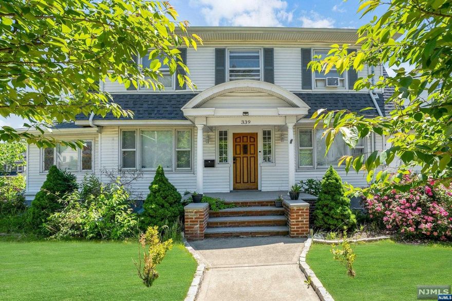 Nestled in the heart of Paterson's esteemed historic preservation area and just two blocks from major highways and the picturesque East Side Park Historic District. This stunning corner property merges timeless elegance with strategic location, offering a rare opportunity to own a piece of history. The first floor features a spacious, modern kitchen, cozy living room, sunroom, den, family room, and a bathroom, ideal for entertaining and comfortable living. The second-floor houses four serene bedrooms and a full bathroom, while the fully renovated attic on the third floor adds an extra bedroom and bathroom, perfect for guests or as a private retreat. The nearly finished basement includes a kitchen, bathroom, living room, and bedroom, offering versatile space for an office, guest suite, or recreational area. The property also boasts a driveway with parking for at least four cars and a private backyard enclosed with a privacy fence, ideal for summer barbecues. Move-in ready.