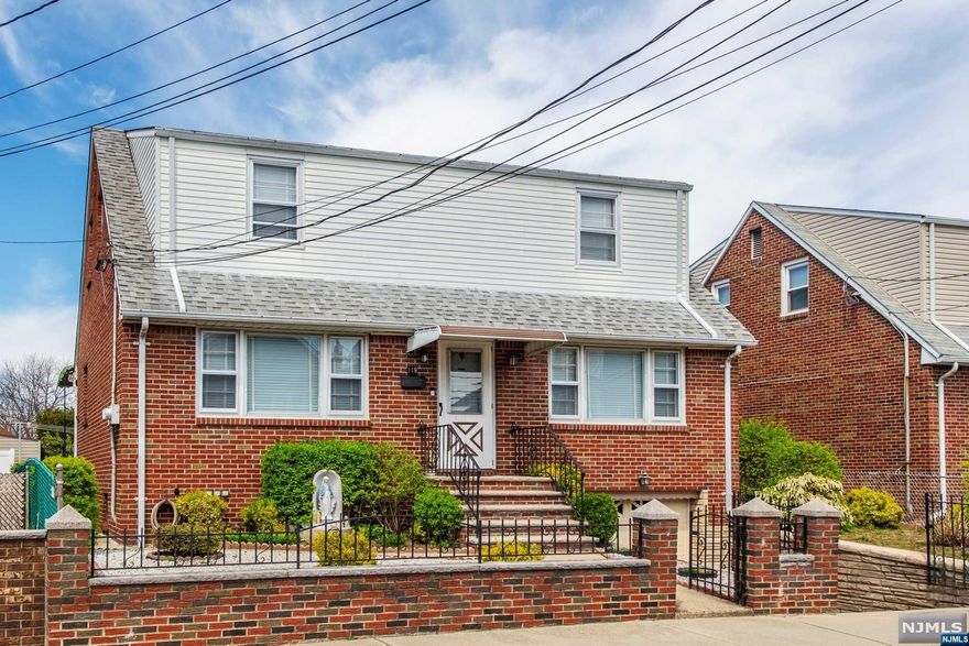 This well-maintained property offers two spacious units in an excellent location. Unit 1 encompasses the main living level and basement. The first level features three bedrooms with large closets, one full bathroom, eat-in kitchen with plentiful cabinet space, and a living room. The full, finished basement features additional recreation space, secondary kitchen, half bathroom, and outdoor access. Located on the second level, Unit 2 features two bedrooms, one full bathroom, eat-in kitchen, and a living room. Both units boast hardwood floors in bedrooms, central A/C, good natural light, and access to the large, fenced backyard with patio. Enjoy close proximity to shopping & dining, and easy commuting access to Route 3 and public transportation.