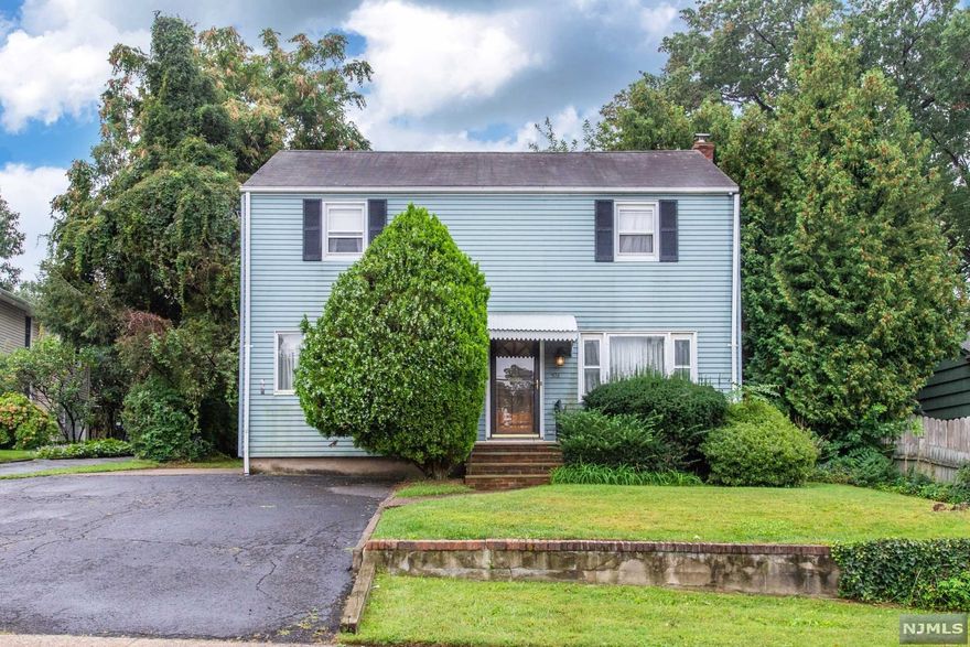 Large and spacious 3 bedroom colonial in the heart of Bergen County. Close to all major highways including Parkway, Rt 80, Rt 46,Rt 4, Rt 17 and 15 mins from the GW Bridge and Lincoln tunnel location is unbeatable. EIK opens to your large family room/ dining room. Half bath and living room on first floor. 3 very spacious bedrooms and full bath on second floor. Large deck is great for entertaining and over looks your oversized private yard. Full basement with a finished area for even more living space and the laundry and storage room. Wood floors through out. House is vacant and ready for a quick closing. This is an estate sale.