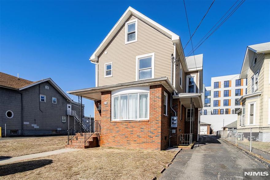 Second floor apartment with private entrance in the heart of Hackensack boasts hardwood flooring, fresh paint throughout, eat-in kitchen, and unfinished walk-up attic with tons of storage. Prime location is super close to Anderson Street train station, express NYC bus, and downtown shopping and dining! Rent includes one off-street parking space. Tenant pays heat, hot-water, gas and electric. Credit check and proof of income required.