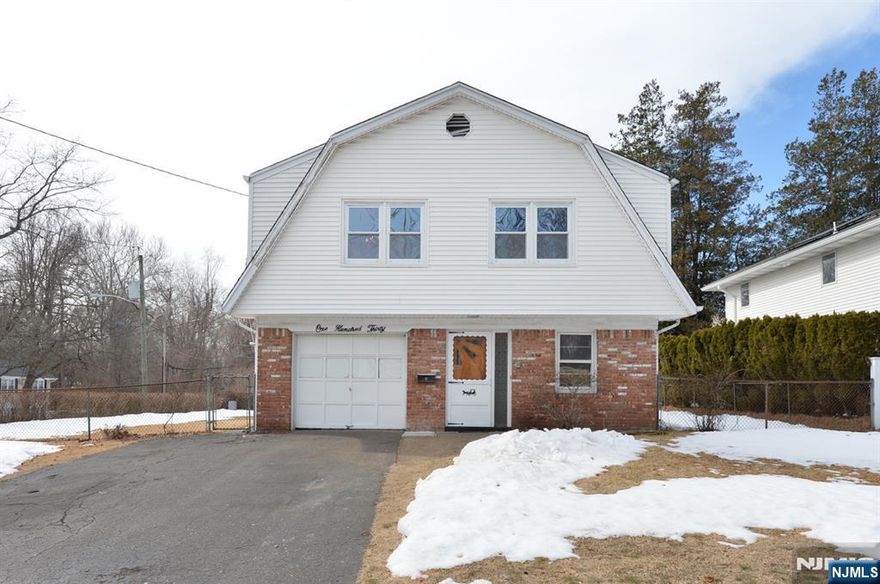 You've been hoping for this...a quiet, yet convenient location...a spacious, solid home full of light...plenty of room for the whole family...a large backyard. Close your eyes and imagine the summer barbecues waiting to happen. Just a little imagination will polish this gem and make it shine!