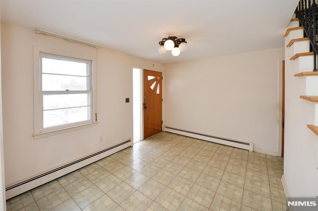 Photo of 130 Washington Avenue, New Milford, NJ 07646 (MLS # 26004808)