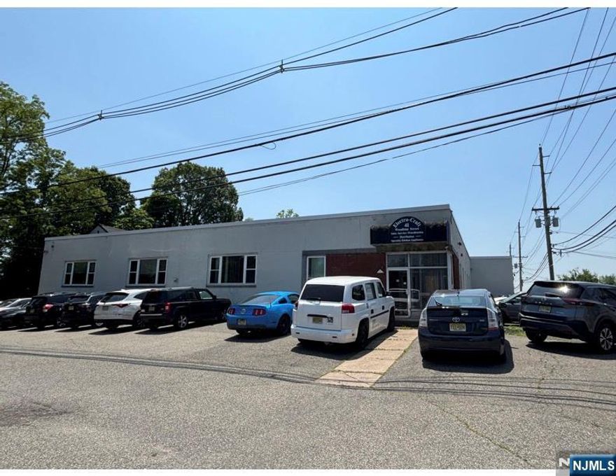 New roof installed, 12,500 SF warehouse building with approx 1500 SF of office space, 25 car parking, 12.5' net clear ceiling height, 2 loading dock entrances. Perfect for storage. Zoning "M - Light Industrial" good for many uses. Owner willing to lease with option to buy. Easy Access to all highways, close to George Washington Bridge.
