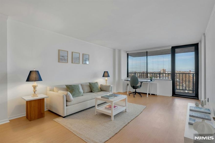 Step into this sun-filled 1BD/1BA home with a private balcony, sweeping picture-perfect NYC skyline views, and breathtaking sunset views that fill the space with warm, golden light! This home features an open living/dining room layout with ample closet space. Modern kitchen with stainless steel appliances and plenty of cabinet space. Renovated bathroom offers a clean, well-maintained look with neutral stone-tile walls that create a warm, classic feel. Troy Towers offers the lifestyle everyone wantsâ€”full-service luxury living, with a myriad of amenities. Enjoy the outdoor pool, 24HR concierge and security, Amazon Hub, valet services, and laundry on every floor. Garage parking and an on-site gym are also available for an additional fee. Monthly maintenance includes taxes, all utilities, cable and internet. Commuting is a breeze: NYC buses and free PATH shuttles pick you up right at the front door during rush hour, and you're just minutes to the Lincoln Tunnel, Hoboken, and waterfront dining. Parks, shopping, and everyday conveniences are all nearbyâ€”Whole Foods, Trader Joeâ€™s, Walgreens and more. Board approval is required; Sq ft quotes have never been provided by the building, so sq. ft. quotes for similar units may be inconsistent or inaccurate. Initial purchases must be owner-occupied for a minimum of two years. Cats, birds, fish are ok. 1 dog allowed per apartment. Ready to make this view your own? Letâ€™s get you in for a private tour!