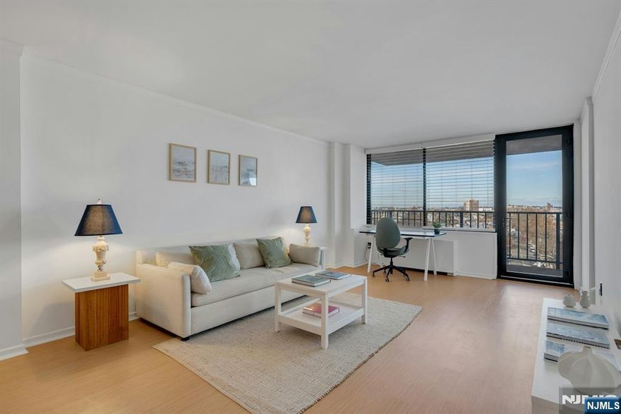 Step into this sun-filled 1BD/1BA home with a private balcony, sweeping picture-perfect NYC skyline views, and breathtaking sunset views that fill the space with warm, golden light! This home features an open living/dining room layout with ample closet space. Modern kitchen with stainless steel appliances and plenty of cabinet space. Renovated bathroom offers a clean, well-maintained look with neutral stone-tile walls that create a warm, classic feel. Troy Towers offers the lifestyle everyone wantsâ€”full-service luxury living, with a myriad of amenities. Enjoy the outdoor pool, 24HR concierge and security, Amazon Hub, valet services, and laundry on every floor. Garage parking and an on-site gym are also available for an additional fee. Monthly maintenance includes taxes, all utilities, cable and internet. Commuting is a breeze: NYC buses and free PATH shuttles pick you up right at the front door during rush hour, and you're just minutes to the Lincoln Tunnel, Hoboken, and waterfront dining. Parks, shopping, and everyday conveniences are all nearbyâ€”Whole Foods, Trader Joeâ€™s, Walgreens and more. Board approval is required; Sq ft quotes have never been provided by the building, so sq. ft. quotes for similar units may be inconsistent or inaccurate. Initial purchases must be owner-occupied for a minimum of two years. Cats, birds, fish are ok. 1 dog allowed per apartment. Ready to make this view your own? Letâ€™s get you in for a private tour!