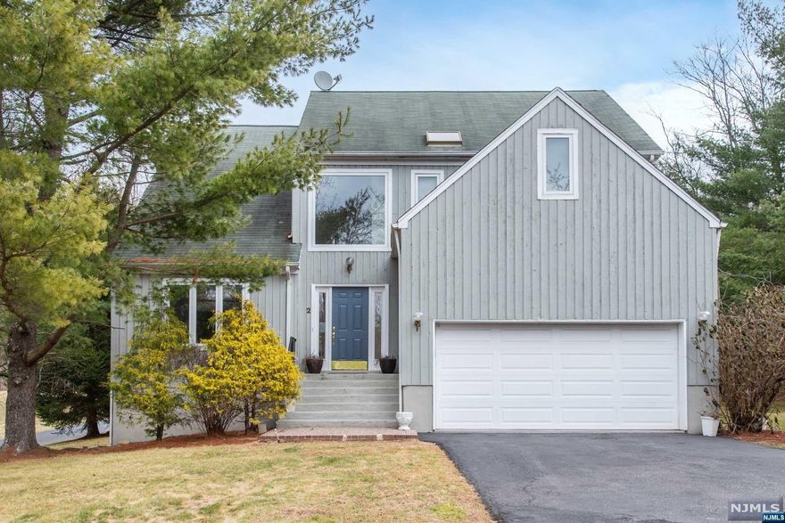 Brookview Circle is a lovely CUL de SAC and number 2 Brookview is a stunning contemporary that checks off all of the boxes. Measuring just under 4,000 sq ft. this wonderful house is sun-filled and cheerful with vaulted ceilings and an open plan concept that is ideal for entertaining. The 1st floor has a formal LIVING ROOM, formal DINING ROOM, a great big spacious KITCHEN with gleaming Stainless Steel appliances, tons of storage and a big island that opens on to the stunning GREAT ROOM, an enormous GUEST SUITE with sliders that open on to the beautiful DECK, a POWDER ROOM & access to the attached 2 CAR GARAGE. Upstairs there are 4 spacious BEDROOMS 3 of which are EN-SUITE. There is a humongous FINISHED BASEMENT. Additionally there is 2 zone AC and 2 zone heating. Randolph is a wonderful area an hour west of NYC with great schools, close to shopping and transportation. Come see for yourself and be WOWED!