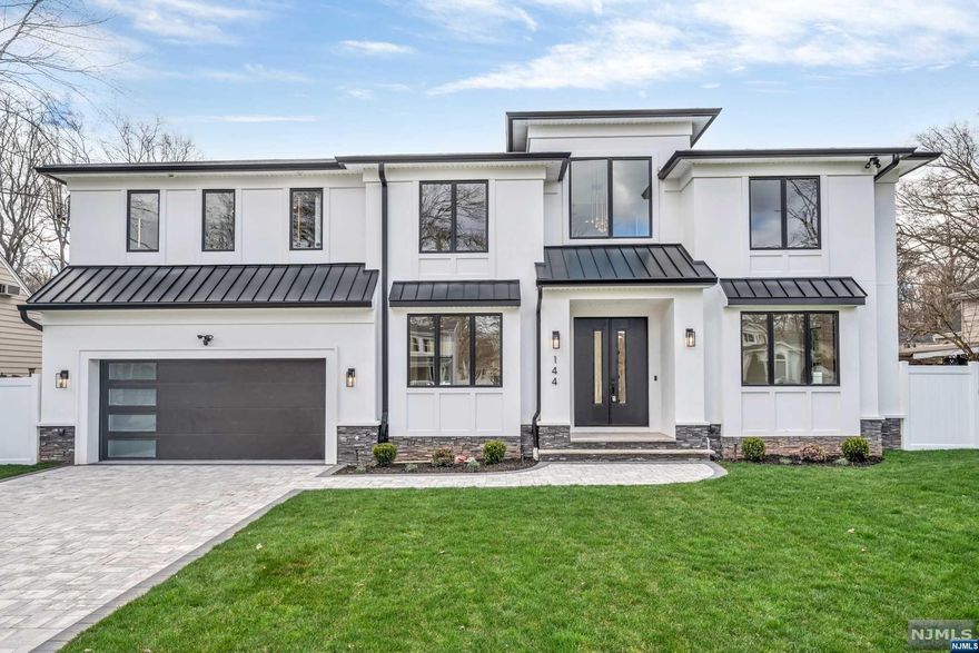 Stunning Brand-New Construction home on the ULTRA-DESIRABLE East Side of Paramus, sitting on a quiet, tree-lined street! Gorgeous exterior w. crisp white stucco on all sides. 6 bedrooms & 6.5 bathrooms & 6,578 sq ft of living space w. a walk out basement. Grand 2 Story Foyer leads to formal LR, DR, Great Room, & Kitchen w. designer cabinetry, professional appliances, huge center island, walk in pantry + mudroom. 1st level also hosts Guest Bedroom w. en-suite bath! Upstairs, the Primary Suite features a gorgeous en-suite bathroom w/ soaking tub & makeup bar, plus MASSIVE WIC & an additional 3 bedrooms, each w. en-suite bathrooms & WICs. Fully finished & amenity packed basement w. Movie Theater, Gym, Bedroom, Office, Full Bath, & Rec Room. All bathrooms in this dream home are truly STUNNING w. designer finishes. Full SMART home capabilities w. lighting & sound system controlled by your fingertips. Paramus is home to amazing schools, LOW TAXES, easy commuting, & great shopping.