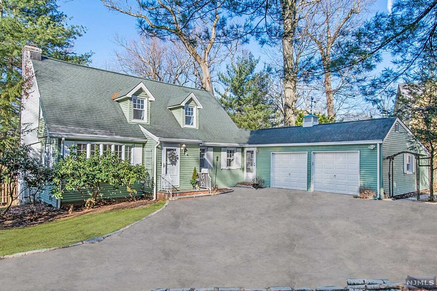 A charming facade with a sweeping long driveway all lead to this quintessential Essex Fells property. Surrounded by a woodsy feel be en-captured by nature. This home sits proud on almost half an acre of property located close to Essex Fells Fields, downtown Caldwell, major highways, top rated schools and close to trains/buses to NYC. Upon entry you are greeted by the sun filled living room with hardwood floors and a wood burning fireplace. Powder room is off of the living room. Quaint kitchen with gas range oven, stainless steel dishwasher, refrigerator and microwave. Formal dining room opens up to the kitchen/family room great for entertaining. Spacious laundry room is off of the kitchen that also acts as a utility room. Wonderful sized family room with exterior access and a interior garage entrance. Second floor is home to two large bedrooms with generous sized closets and main bathroom. Oversized two car garage has additional storage space. Turn this house into your dream home!