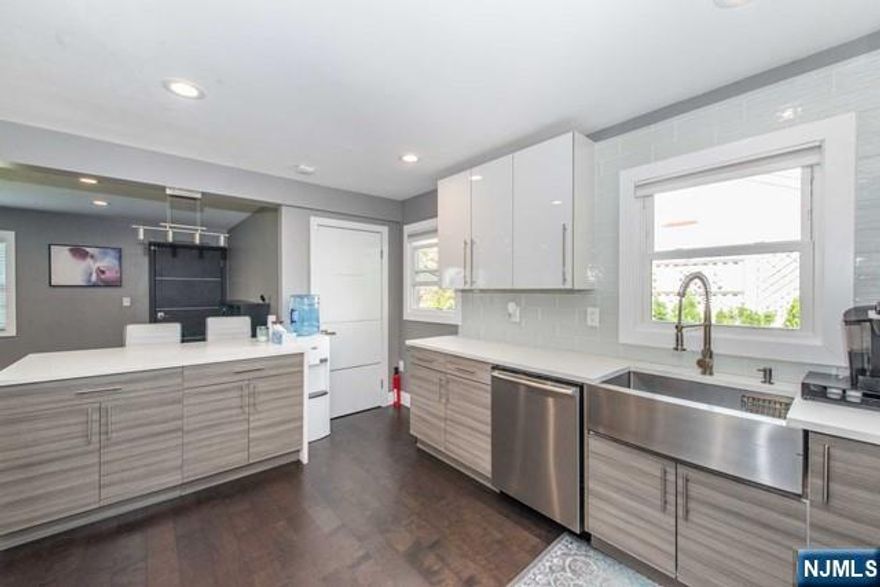 Amazing location! This modern and bright first floor unit features OPEN FLOOR PLAN, updated kitchen w SS appliances, 3 bedrooms( one currently used as dining room), 1 and a half baths, laundry hook-ups, deck, storage. It is offered furnished but landlord willing to remove furniture if needed.