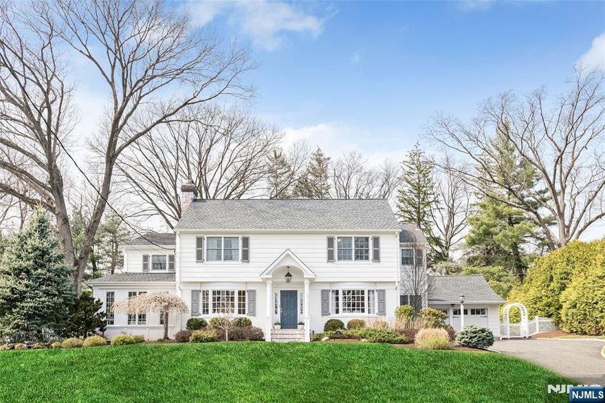 Simply Stunning! This elegant Colonial seamlessly blends classic charm with modern convenience and is ideally situated with direct access to Ridge School on over .5 acres. The 1st floor boasts a sunlit living room with a FPL, spacious eat-in kitchen, welcoming family room with an additional FPL, formal dining room, butlerâ€™s pantry, stylish lounge, private office, and mudroom with built-in storage. On the 2nd floor, the primary suite features a walk-in closet & en-suite bath. Three additional bedrooms, a hall bath, and a fourth bedroom with its own en-suite bath provide ample space and comfort. The unfinished third floor offers additional storage, while the finished basement includes a family room, laundry room, and utility space. The beautifully designed backyard is perfect for entertaining, featuring a covered porch, patio, outdoor fireplace, built-in grill, and refrigerator. With a thoughtfully designed layout and an unparalleled location, this exceptional home is truly a must-see!