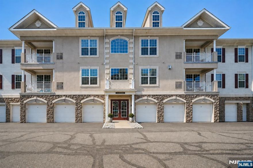 Behind the gates of Four Seasons at Great Notch, experience effortless, elevated living in this beautifully maintained first-floor residence, thoughtfully designed for comfort and convenience. With no stairs and seamless single-level access, this home offers a refined lifestyle within one of the area's most sought after 55+ guard-gated communities. This spacious 2-bedroom, 2- full bathroom layout is enhanced by rich hardwood flooring and a well-appointed design that balances functionality with sophistication. The kitchen features granite countertops, stainless steel appliances and flows effortlessly into the main living space, ideal for both everyday living and entertaining. A dedicated home office provides flexibility, while the in-unit laundry adds everyday ease. The primary suite serves as a private retreat, complete with an ensuite bath with double sinks along with both a separate tub and shower. A private balcony extends your living space outdoors with a view of the beautiful greenery. A one-car garage with interior access ensures both convenience and security.Residents of Four Seasons at Great Notch enjoy an unmatched amenity package, including indoor and outdoor pools, a state-of-the-art fitness center, tennis and bocce courts, a library, and a vibrant social atmosphere.