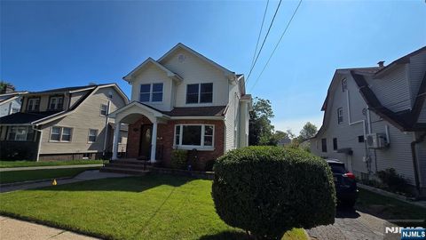 Photo of 303 Hickory St, Teaneck, NJ 07666 (MLS # 25033259)