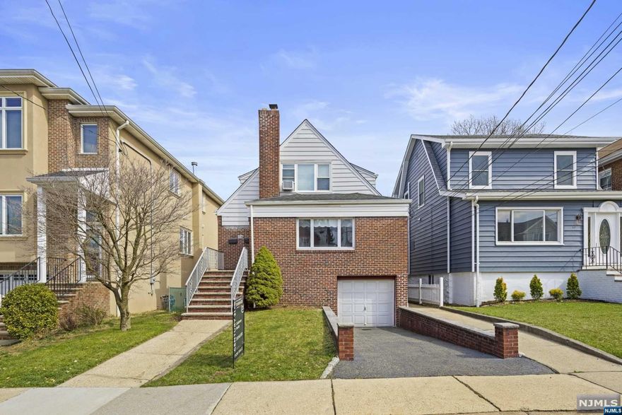 2 FAMILY HOUSE LOCATED IN A GREAT RESIDENTIAL NEIGHBORHOOD. FIRST FLOOR FEATURES LARGE LIVING ROOM, FORMAL DINING ROOM, LARGE EAT IN KITCHEN AND 2 HUGE BEDROOMS AND A FULL BATH. SECOND FLOOR FEATURES LARGE LIVING ROOM, KITCHEN, 2 BEDROOMS AND FULL BATH WITH PRIVATE ENTRANCE. GROUND FLOOR IS FULLY FINISHED. ENCLOSED BACK YARD AND GARAGE PARKING