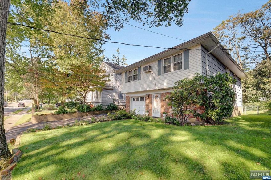 Location, Location, Location. One-Owner custom built home. Located a short distance from Mackay Elementary, Tenafly Middle and High School. Buyer has the opportunity to live in the desirable town of Tenafly. First floor large entry foyer leads to an excessive large family room, a full bath, laundry mechanic room and storage. Second floor has living room, formal dining room, eat-in kitchen, 3 spacious sizes bedrooms and full bath. Hardwood floors, one car attached garage. Professionally landscaped property is 50x140. Convenient to shopping, parks, houses of worship and NYC transit. The house is sold AS-IS. Don't miss this opportunity to renovate or build your dream home.