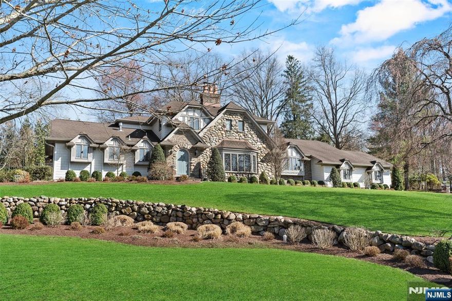 Sitting atop a gentle knoll in sought after Shadow Lake Estates, this custom-built Manor home radiates old world charm. Artisan millwork and leaded glass windows, coupled with tasteful updates, make this home a rare gem. The first floor offers a light filled living room, formal dining room, family room, study and a Peter Salerno kitchen for the discerning chef. From the gourmet kitchen, walk out to the private backyard retreat which includes a salt water pool with waterfall, hot tub, fire pit for toasting sâ€™mores and an outdoor kitchen with top of the line Lynx appliances. The first floor is also where youâ€™ll find a tranquil Primary Suite warmed by a gas fireplace. For the car collector, this home offers a 2-car attached garage, plus a detached 2-car garage. Located thirty minutes from Manhattan, this residence is part of Shadow Lake Estates, an enclave of special properties with membership only access to a lakefront clubhouse, tennis and pickleball, boating, fishing and swimming.