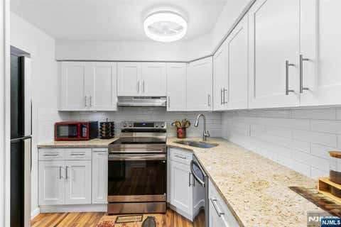 Photo of 464 Liberty Street #107 B, Little Ferry, NJ 07643 (MLS # 26026850)