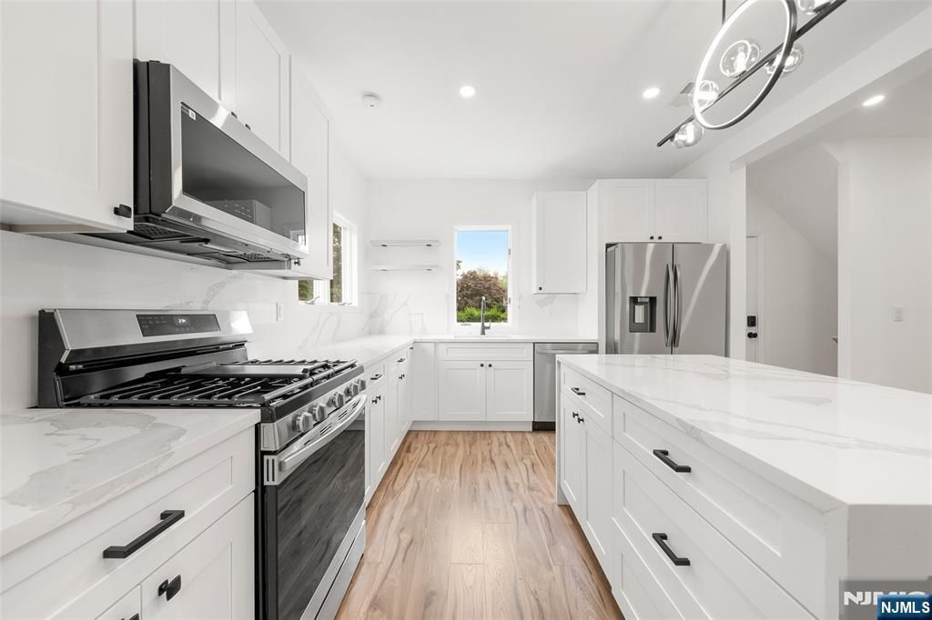 Photo of 174 Pleasant Avenue, Bergenfield, NJ 07621 (MLS # 25036454)