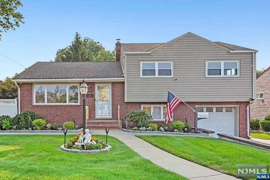 Don't miss this beautiful expanded split-level home offering 4 spacious bedrooms and 2.5 baths across 1,772 sq. ft. of living space. The heart of the home is the granite kitchen with a breakfast island and stainless steel appliances. Enjoy meals in the dining room with sliding doors leading to a Trex deck overlooking the oversized 60x140 lot. The primary bedroom features a private en-suite 1/2 bath. The ground floor includes a large bedroom/rec room, office, full bath, and summer kitchen, perfect for multi-generational living. Outside, the large yard features a paver patio with a gazebo, above-ground pool, and a large shed. Additional highlights include central air, forced hot air heating, underground sprinklers, a paver driveway, attached 1-car garage, finished basement with wine cellar, whole-house generator with transfer switch, and solar panels. Ideal for families looking for a move-in ready home with space and amenities!