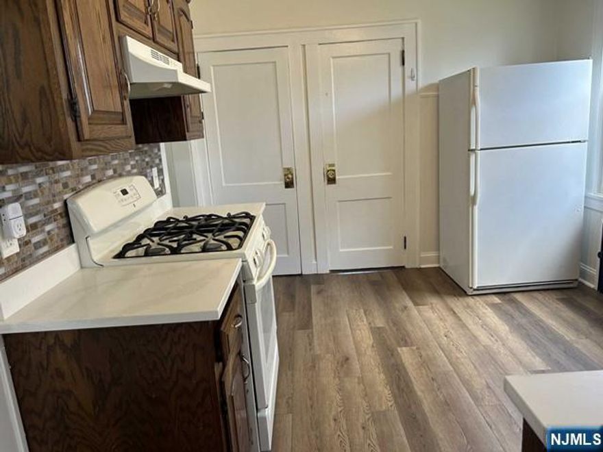 Don't judge a book by it's cover! This is a renovated 3 bed/1 bath rental unit on 1st floor of 2-family home. Eat-in-kitchen with quartz countertops and pantry. Good size bedrooms with closets in all. Washer/dryer hookups in unit. Enjoy the summer weather relaxing on the large front porch and BBQ's in backyard. Parking for 1 car in rear. Centrally located to schools (McKenzie Elementary across the street), bus, train and major highways. No pets. Available early February.