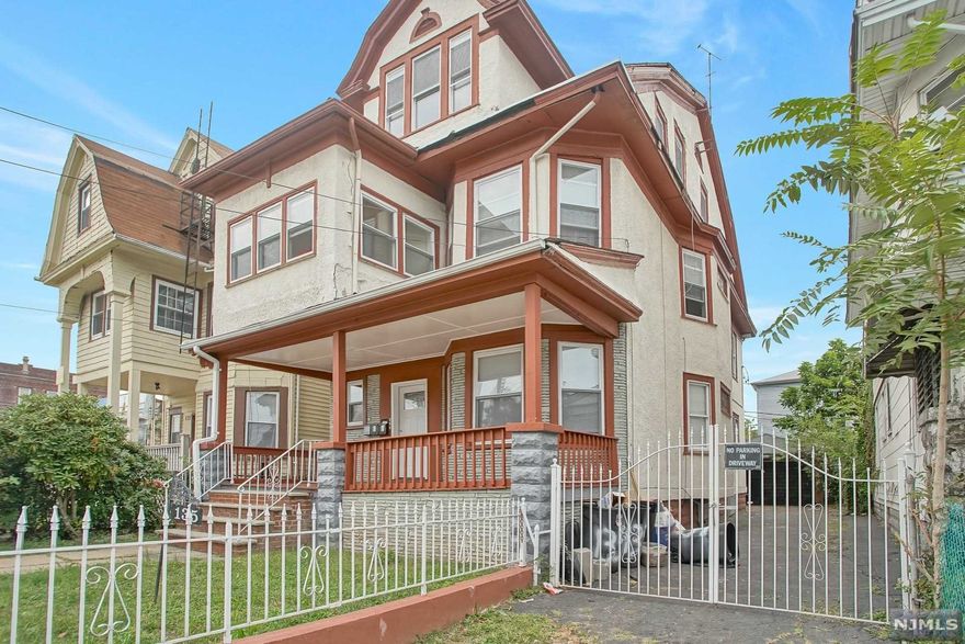 Great opportunity to own this income producing three family home in the Weequahic section of Newark. All units have been completely renovated with new hardwood floors, tiles, windows, bathrooms and kitchens. The roof was replaced this year, new French drain system and sump pumps (Done this month), all boilers and hot water heaters are fairly new as well. Driveway parking for multiple cars and two car garage. All three units are currently rented.