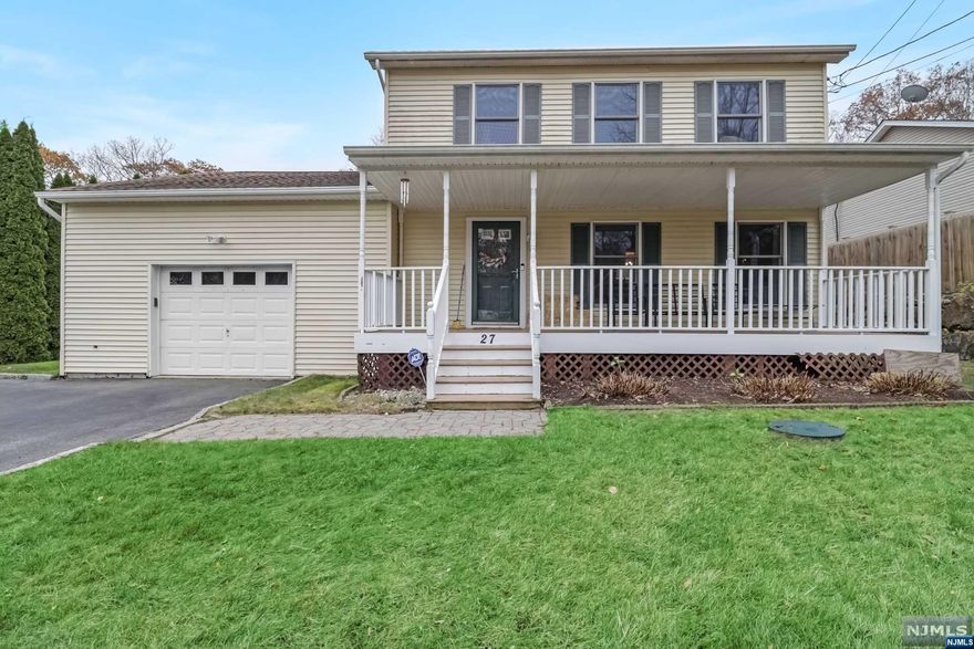 Welcome to this exceptional Colonial home, Upon arriving at this property, you'll be captivated by its striking curb appeal. A beautiful front porch welcomes you, setting the stage for the warmth and character that awaits within. Step inside to discover a spacious and inviting living room. The heart of this home is the dining room, featuring sliders that open onto a generous deck overlooking private yard. Second Floor offers: Master bedroom suite w/ lots of closets & a master bath. Two additional Bedrooms and full bath. Unfinished basement that boasts high ceilings, offering ample potential for future expansion or customization. Above ground oil tank & radon system, One car garage. Enjoy Upper Greenwood Lake Community Offers Members Only Beach & Clubhouse, Motor Boating, Kayaking, Swimming, Fishing, Jet Skiing & More Plus Year Round Activities! Just 1 Hour To NYC & Close To Major Highways, Shopping, Dining, Golf Courses, Ski Resorts, Wineries, Apple Orchards, Drive-In Theater.