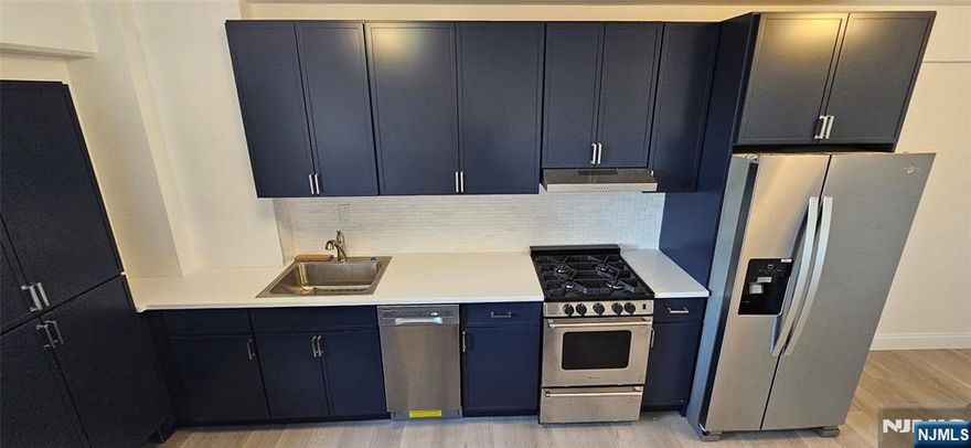 SEE OPEN HOUSE DETAILS 3/7 & 3/8: SUNSET VIEWS & UNBEATABLE VALUE: YOUR "STUDIO PLUS" SANCTUARY ON THE PARK. Experience the best of the Gold Coast in this oversized, fully renovated 553 sq. ft. "Studio Plus." Perfectly situated directly across from the 167-acre James J. Braddock Park, our local Central Park, this home offers a rare combination of luxury, and space. THE SPACE: open-concept design. This sun-drenched haven features a seamless living, dining, and sleeping layout that feels surprisingly expansive. The updated kitchen features a generous island perfect for entertaining, modern appliances (dishwasher included), and an open layout designed to maximize natural light. Brand-new laminated wood floors, ample cabinet space, and a contemporary bathroom complete. THE "PLUS" FACTOR: Beyond the open living area, enjoy a multifunctional nook perfect for a home office or personal retreat, plus breathtaking sunset views over the parkâ€™s lakes from abundant windows. ALL-INCLUSIVE LIVING: Total peace of mind with ALL utilities included and one assigned parking spot. The building offers dual elevators, a brand-new on-site laundry center, and secure intercom entry. COMMUTER GOLD: NYC is minutes away. Steps from NJ Transit buses on Boulevard East, ~0.5 miles to City Place shopping, ~4 miles to the Weehawken Ferry, and ~5 miles to the Lincoln Tunnel. THE STRATEGIC MOVE: Perfect for first-time buyers or 1031 Exchange. Experience the best sunset on the Boulevard.