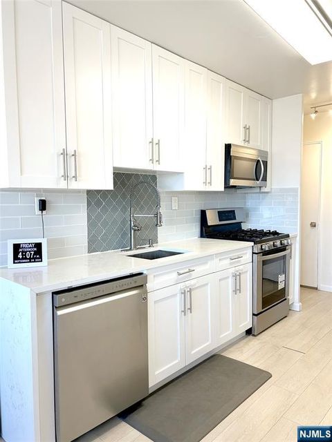 Photo of 2185 Lemoine Avenue #4E, Fort Lee, NJ 07024 (MLS # 25034874)