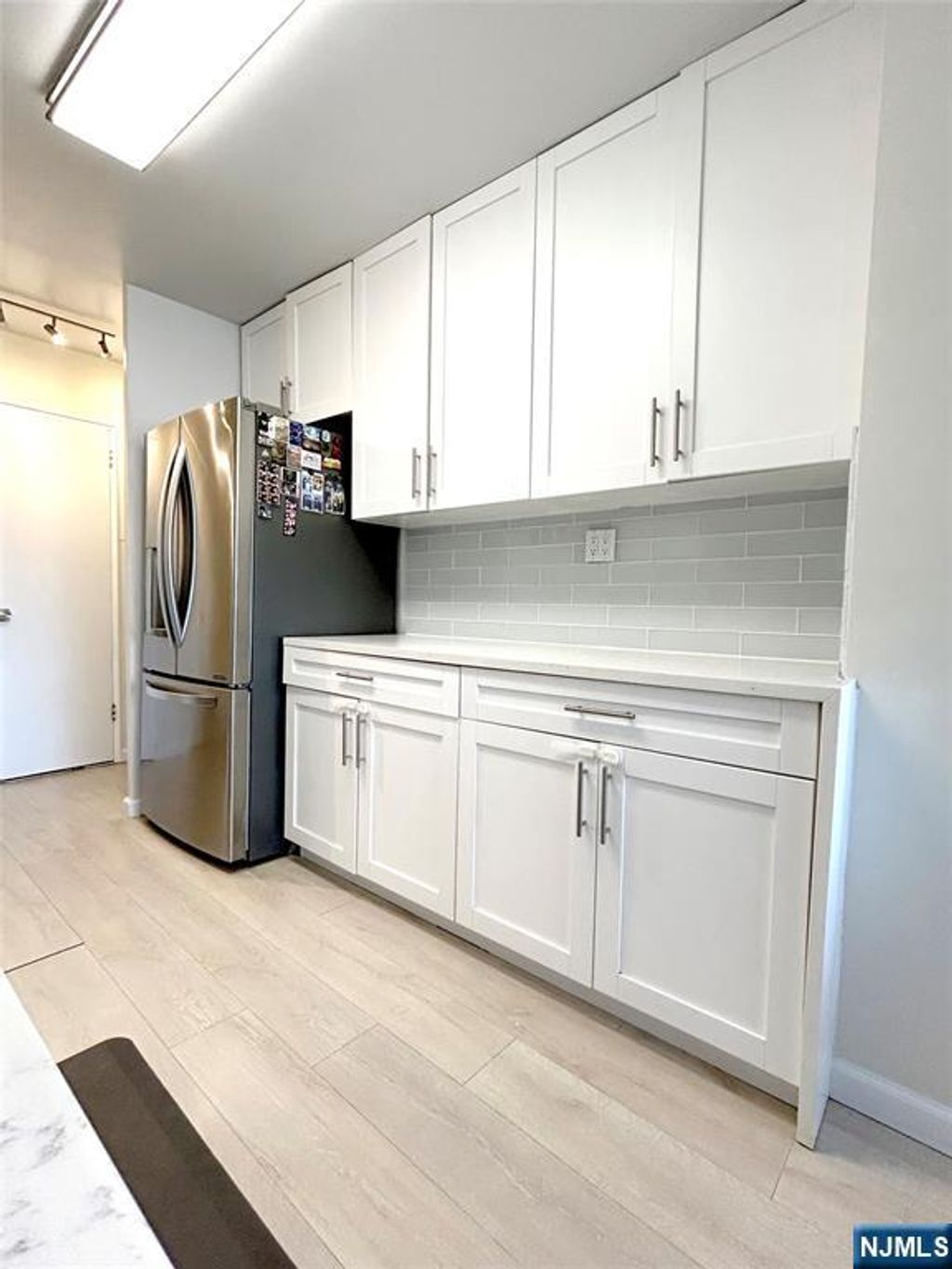 Photo of 2185 Lemoine Avenue #4E, Fort Lee, NJ 07024 (MLS # 25034874)