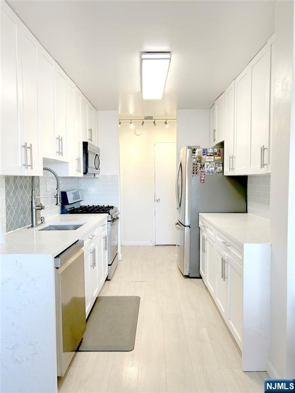 Photo of 2185 Lemoine Avenue #4E, Fort Lee, NJ 07024 (MLS # 25034874)