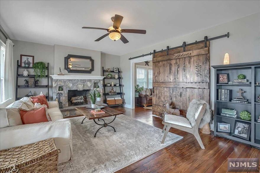 This home is truly a gem. A showcase home in a very desirable neighborhood. The outstanding quality and exceptional design of this home will surpass all expectations. Set on a level 80 x 165 fenced property on a quiet wide street of larger homes close to town. This three to 4 bedroom two full bath Cape Cod Colonial exudes charm and character. An open layout between kitchen, dining room and living room with the option to use the first floor office as a bedroom suite w/ full bath and laundry for one floor living. The kitchen is the heart of the home with white cabinets, granite, ss, and breakfast bar. The spacious living room is anchored by the wood burning fireplace and wall of large windows overlooking the front yard and generous porch! Three nice size bedrooms upstairs with a custom bathroom featuring heated marble floor, white brick tile and white vanity, custom shower with enclosure. The lower level features storage, a new boiler and a large recreation room. This is a jewel!