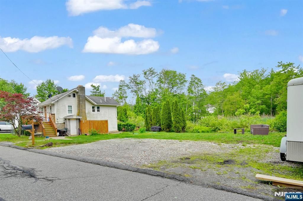 Photo of 3 Riverside Road, West Milford, NJ 07421 (MLS # 25035976)