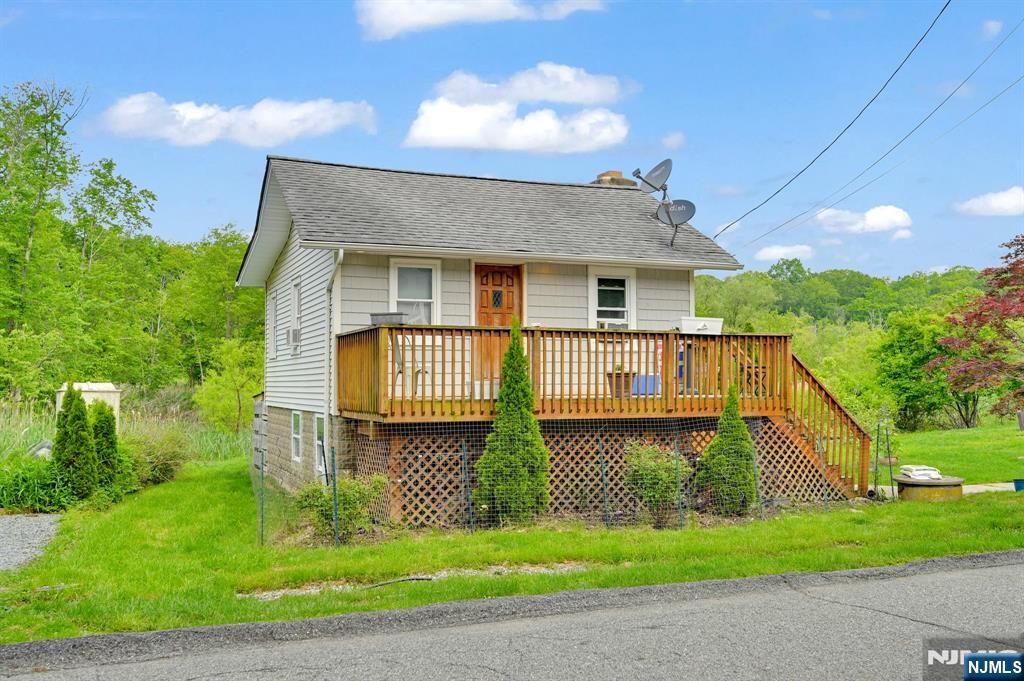 Photo of 3 Riverside Road, West Milford, NJ 07421 (MLS # 25035976)