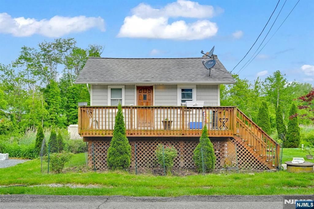 Photo of 3 Riverside Road, West Milford, NJ 07421 (MLS # 25035976)