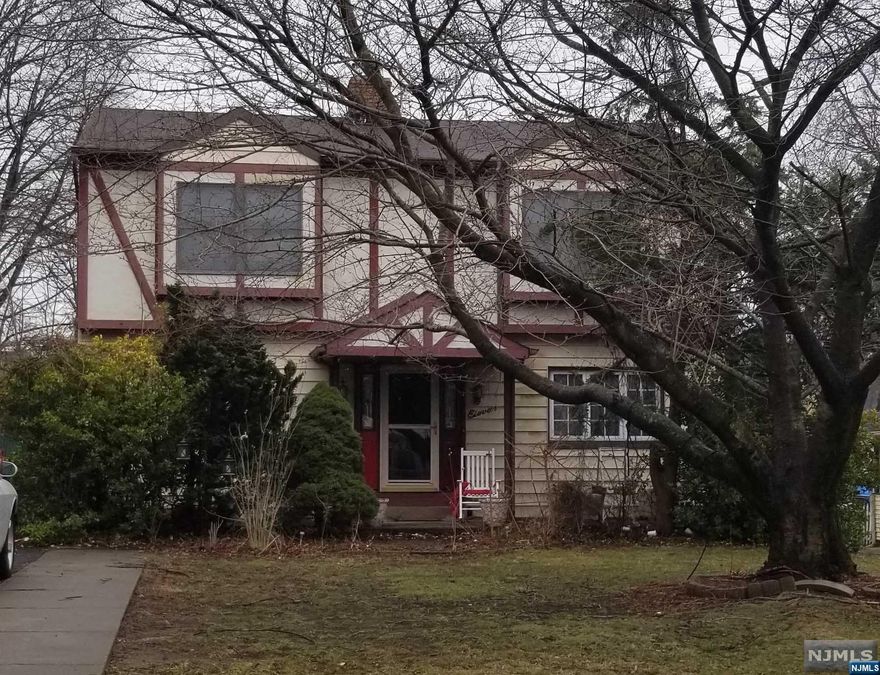 To be sold as is. Large 2388 sq ft of living space in this family home in sought after location. 4-5 Large bedrooms with lots of closet space. (1 on first floor could be home/office.) 2 full baths and a family room with wood burning stove/woodburning fireplace in LR. Large eat in kitchen has a center island. Appliance and other upgrades needed as well as some interior and exterior repairs. Oversized property 200 ft deep. This home has a huge potential for the right buyer.