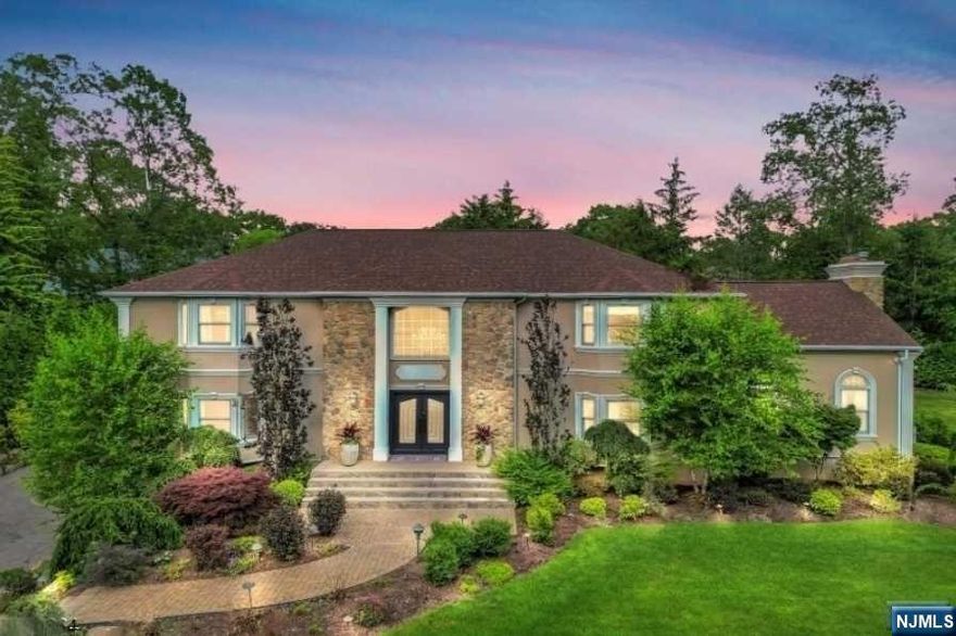 Introducing the Home You've Been Waiting For! Welcome to this extraordinary luxury colonial home, boasting 5 beds, 4.5 baths, & over 4,000 sq ft of exquisite living space. Situated on a beautifully landscaped property spanning over half an acre, this residence offers a world of tranquility, complete with an in-ground pool & a serene koi pond.Step inside & be greeted by a grand 2-story entryway that leads to the formal living room, huge dinning room, & a chef's kitchen, featuring a custom-built bar, perfect for entertaining. The family room boasts lofted ceilings & a cozy wood-burning fireplace. On the 1st fl., you'll also find a bedroom with an en-suite bathroom, a laundry room, & a powder room.Retreat to the oversized primary suite on the upper level, offering a tray ceilings, walk-in closet, & a luxurious bathroom. 3 additional bedrooms, & a full bathroom complete the 2nd floor.