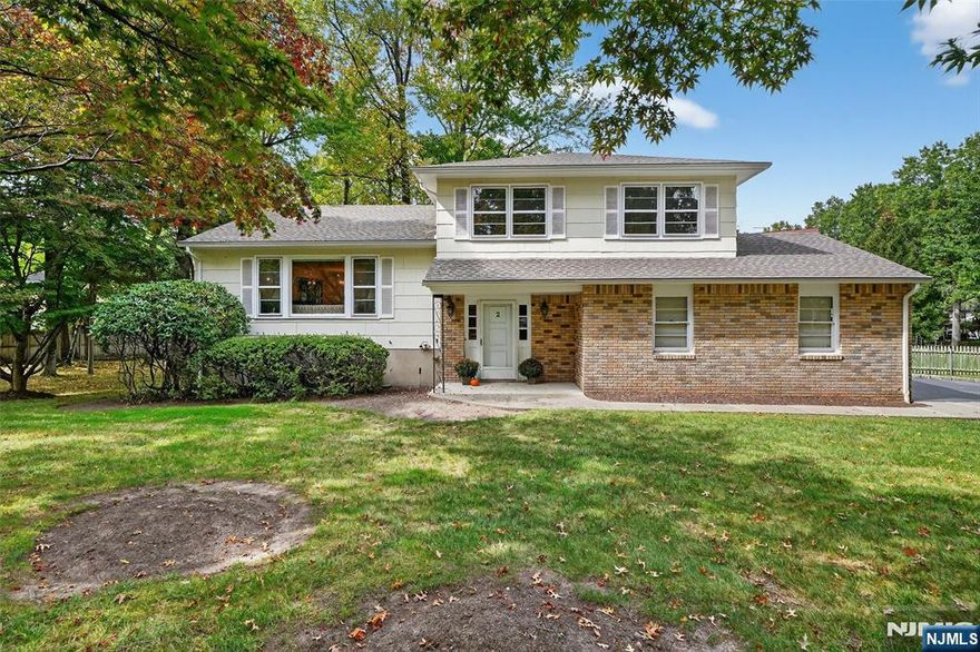 Amazing Opportunity to Own in the Wonderful town of Closter! Welcome to this 3 bedroom, 2 full and 1 half bath SUGAR MAPLE split with a finished basement and 2 car garage on a Cul-de-sac! You will love the large entry, spacious and sun-lit living room, dining room and kitchen. The entry leads you to a family room with access to a large deck and yard, a powder room and the 2 car garage. Head upstairs from the LR to the Primary Suite, Primary bath and 2 spacious closets. There are 2 additional bedrooms and a full main bath. You will love the finished basement with a vintage built-in entertainment center, rec room, laundry and storage. Amenities inc Central Air, baseboard heat, hard wood floors and a fenced-in yard. Excellent schools. NYC trans, steps to a park with tennis and a playground and great restaurants and shopping. Move right in Today!