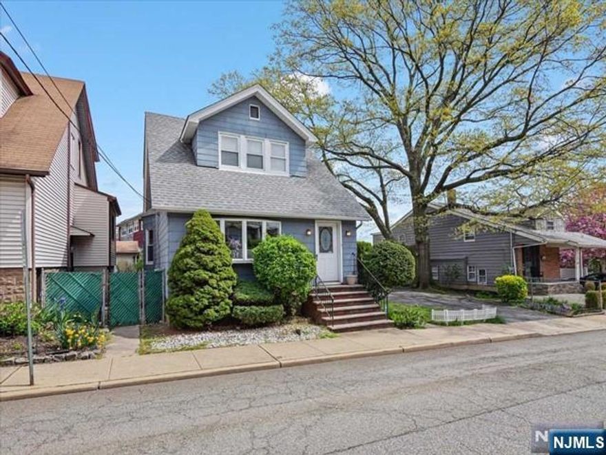 CALLING ALL BUILDERS - PRIME LOCATION! Presenting for the first time since the 1950s one of the few single family homes currently on the market in Edgewater. Nicknamed one of the largest lots in town, this property offers 4200 sqft of opportunity. This 3 bed 1.5 bath colonial is adjacent to it's huge detached garage and driveway large enough for at least 2 additional cars. This home is located amongst several multi-family structures and is walking distance to schools, shops, restaurants, and NYC transportation. 70x60 Lot, Value is in the land. Don't miss out on this rare opportunity to own prime real estate this side of the Hudson!