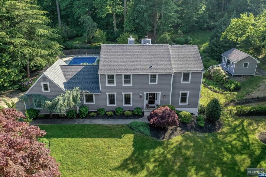 Magnificent 4 Bed 2.5 Bath Turn-Key Colonial with Primary Suite, In-Ground Pool, Finished Basement & 2 Car Garage is sure to impress! On a stunning 1+ acre lot with curb appeal and resort-like Backyard in sought after Long View Estates, districted for Middletown South HS! Private Backyard offers an IG Pool w/new Salt Cell+ robot cleaner, plush gardens, Paver Patios, Deck w/Pergola, shed +sprinklers. Pristine landscaping & Certainteed Cedar impressions siding welcome you into a spacious, sophisticated interior. HW flrs, custom moldings, newer 2 Zone HVAC sys, rec lights, 2 Gas FPs + French Doors. Gourmet EIK offers SS Appl, granite counters, breakfast bar+ slider to the yard. Formal Dining rm, Living rm, Family rm & 1/2 Bath round out this lvl. Upstairs, BRAND NEW Full Bath + 4 Beds, inc the Primary Suite w/ensuite bath. Fin Basement boasts a Den, Office, Gym, Wet Bar + Laundry w/NEW W+D. NEW Roof(22), new rug runners & more! Convenient to NYC ferry, trains, shopping & beaches!