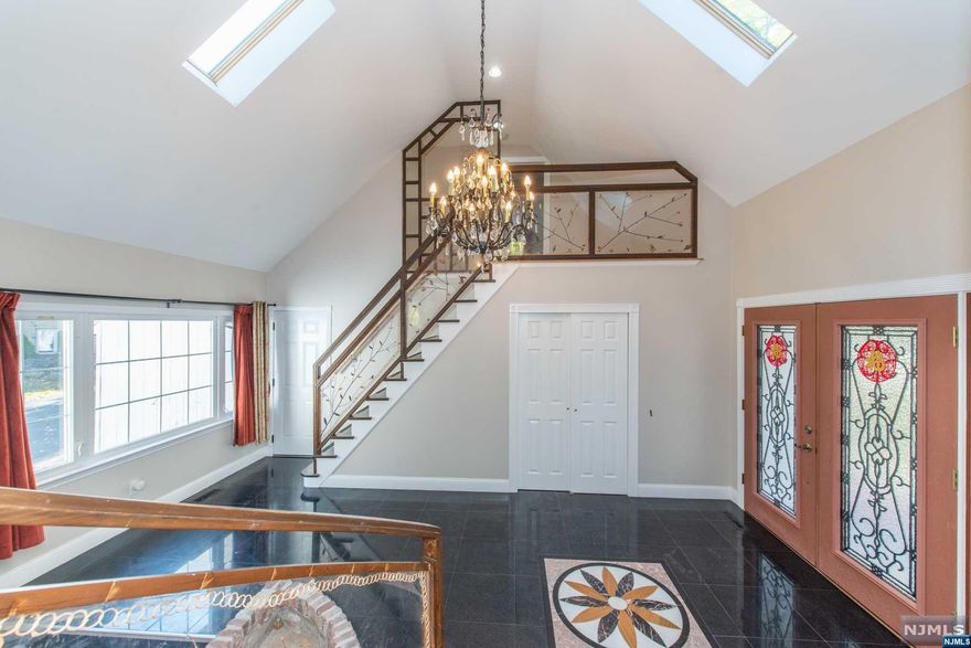 Welcome home! Over 2050 square feet beautiful renovated tri-level single family home conveniently located at the corner of S Orange Ave & Walnut St in move-in condition. The ground floor has 2 bedrooms & 1 full bathroom, a spacious family/recreation room with fireplace, a laundry room and direct access to the backyard. The main level has an open floor plan including a living room, dining room, kitchen with stainless steel appliances, granite countertops and access the deck. Primary bedroom is also on the main level with a built-in closet, plus another bedroom with a full bathroom. The upper level has a 1 bedroom with a full bathroom. Property has 2-car garage and 10-car driveway parking, lush landscaping, park-like view all around... Schedule a private tour today!