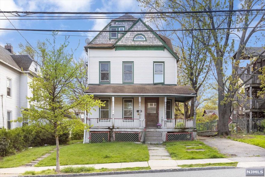 The opportunity you've been waiting for to become a part of Montclair's vibrant downtown and buzzing Walnut Street. This Victorian fixer upper, currently situated as a two family, has an abundance of potential for investors and owner occupied buyers alike. A generous front entry welcomes you, loaded with period details, storage and good flow. The first floor is set up as a 1 bedroom, 1 bath unit, with a large kitchen and extra tall high ceilings. This could easily become a more traditional single family floor plan. Upstairs is a duplex unit with 4 bedrooms and 1 full bathroom. The kitchen can be converted into a luxurious primary suite with plumbing already in place. The basement is equipped with 2 gas meters, 2 electric meters, 2 water heaters, 2 furnaces and plenty of storage. Sold completely AS-IS. Come enjoy being just a few blocks from the best restaurants and shops in town, plus Walnut Street Train station, Montclair Farmers market and more!