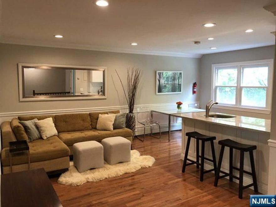 LOCATION LOCATION... Seconds from downtown. RENOVATED- PRIVATE Front Lemonade PORCH and FRONT DOOR. + Private Patio and Washer/Dryer "RARE FIND" in Prestigious Ridgewood. Cheerfully Bright with Natural Sunlight... Eat in Kitchen with breakfast bar plus Room for Table, Hardwood Floors, Great Closet Space in 2 King sized bedrooms.. Spacious and cheerful Living/ dining-room combination. On site parking for 2 cars on Right of Driveway . Lovely Private Yard and Entertainment Patio for BBQ Area. Laundry with private Washer and Dryer (Hard to find) . Basement storage. Lawn care included....photos are from past tenant