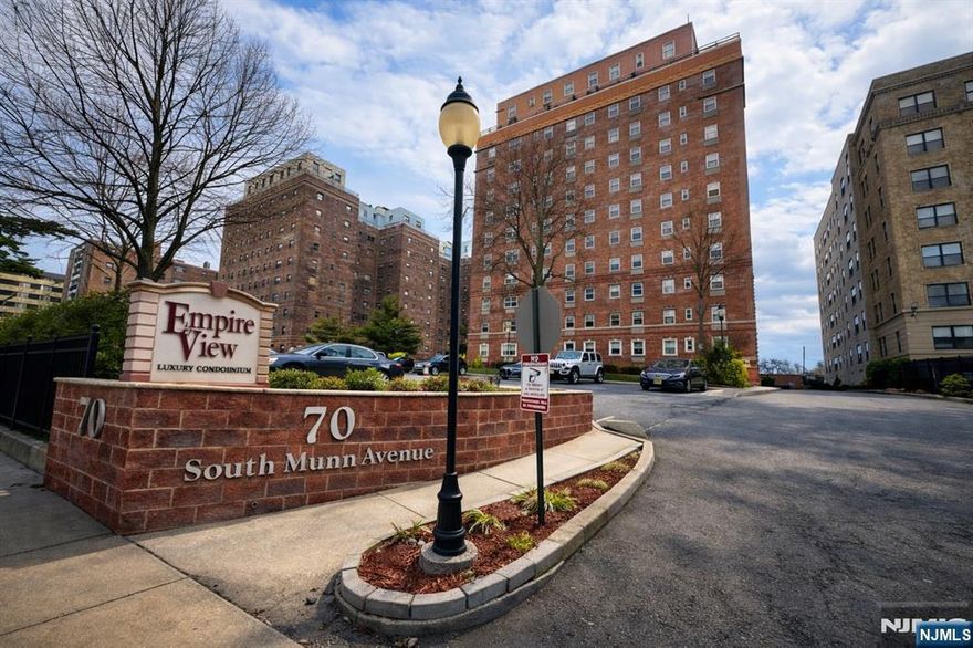 Welcome to Condo #202 in the highly desirable Empire View luxury condominium community. This spacious one-bedroom residence offers approximately 750 square feet of comfortable living space.The generously sized bedroom features two large closets, providing ample storage. The unit also includes stainless steel kitchen appliances, such as a refrigerator, microwave, and dishwasher, along with the convenience of an in-unit washer and dryer. Residents of Empire View enjoy a range of premium amenities including 24-hour concierge and security, a fully equipped fitness center, and a media room with a full kitchen, perfect for entertaining guests. The recently updated lobby and common areas create a welcoming atmosphere upon entering the building. The unit also includes one indoor parking space. Conveniently located near public transportation, major highways, shopping, and dining, Empire View offers both comfort and accessibility. Don't miss the opportunity to own in this well-maintained luxury condominium community.