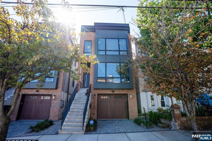 Move right into this modern townhouse built in 2022, offering 3 bedrooms and 2 full baths in a prime location! The bright and airy open-concept living space is filled with natural light and features hardwood floors throughout. The stylish kitchen is equipped with quartz countertops, a large breakfast bar, separate dining area, 5-burner stove, convection oven, and moreâ€”perfect for cooking and entertaining. The spacious primary bedroom includes a walk-in closet with custom built-ins and a private full bath. Additional highlights include central A/C and forced hot air, in-unit washer and dryer, and energy-efficient LED lighting and built in shelving in all closets and built in storage bench in dining room. Enjoy the private rooftop with endless possibilitiesâ€”ideal for relaxing or hosting guests. Conveniently located minutes to the Congress St. Light Rail, Journal Sq PATH, bus lines, shops, restaurants, and major highways including the Lincoln and Holland Tunnels. Monthly parking available nearby or enjoy easy street parking. Donâ€™t miss this move-in-ready gem!