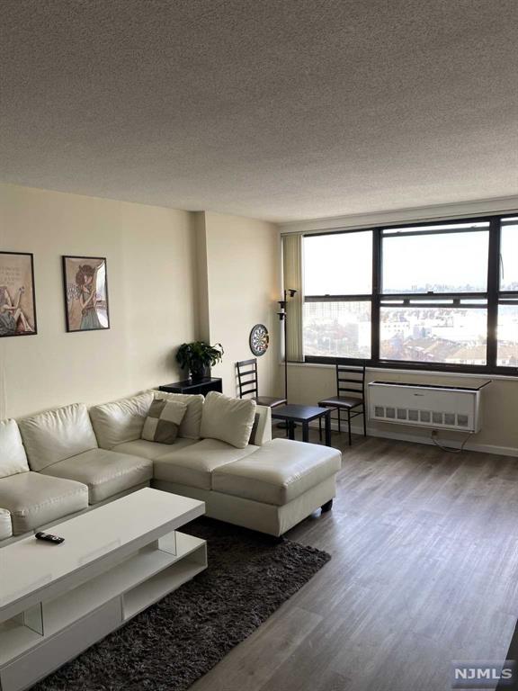 Must see unit with Partial Views of Hudson River. Huge pantry closet and walk-in closet. 1337 sq ft of space offering 2 Bedrooms with 2 Baths. New floor installed throughout home. All Utilities and Amenities are included. Parking $120/M/SP. Full service Building w/ Hotel amenities, Club-I/O Pool, Tennis, State of Art Gym Equipment, Sauna/ Steam Room & more. 24 hour concierge, Shops on Premises. Transportation at Doorstep, 15 min to Manhattan, and minutes to Edgewater Shopping, Whole foods and Trader Joes. January move in and no pets allowed.